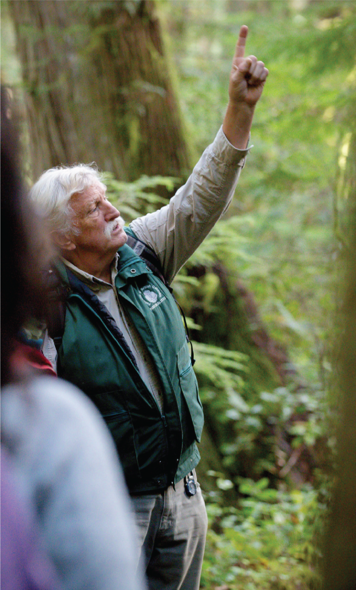 Man hosting nature tour at Hollyhock Retreat Centre in Cortes Island, BC