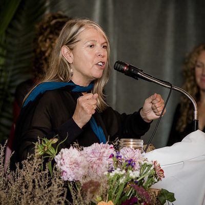 Dana Bass Solomon, the former Hollyhock CEO, giving a speech during a ceremony