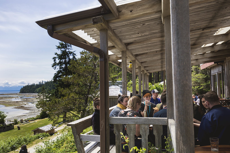 people eating on the deck